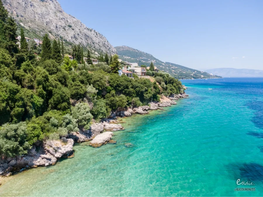 azour ionian boat cruises corfu coastline green hillside